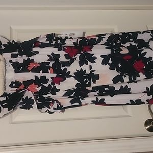 Floral dress. Sleeveless, size 20, never worn.